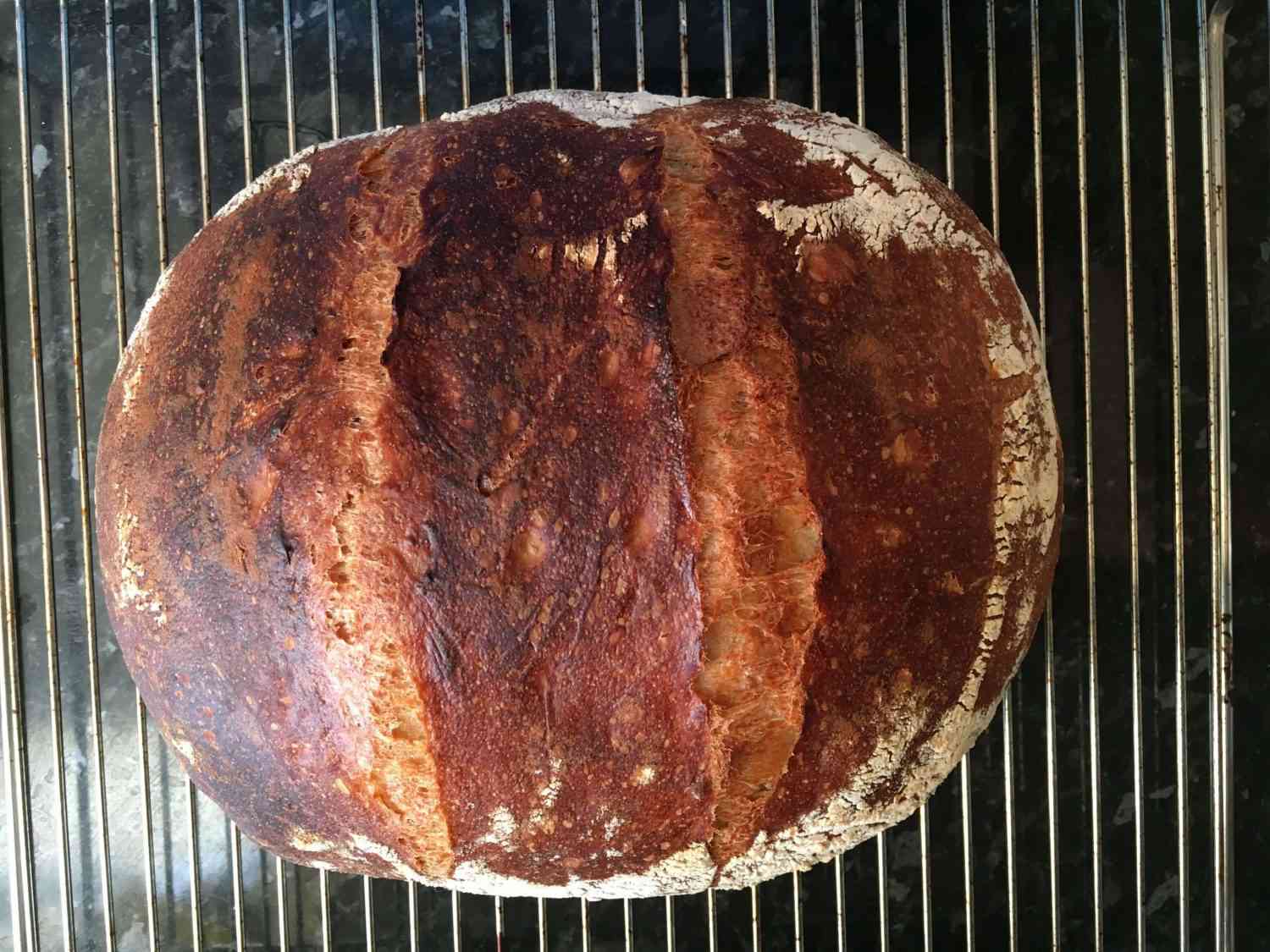 overhead view of loaf of white bread on a rack