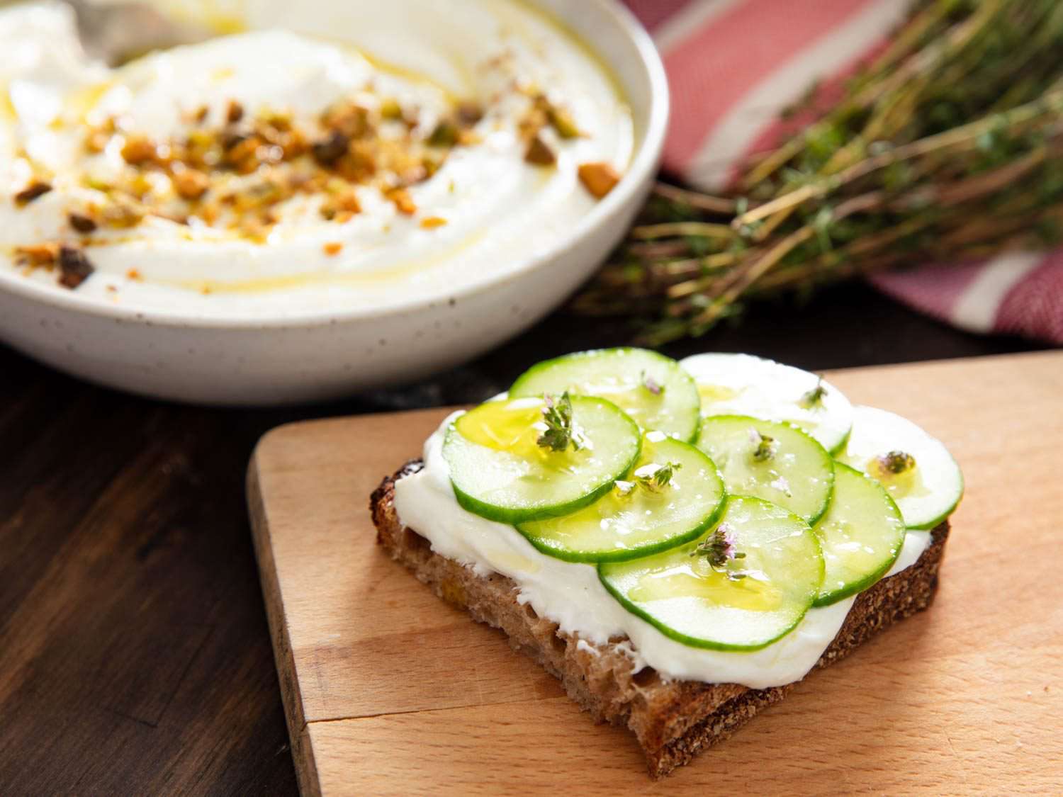 A serving of cucumber toast with whipped feta.