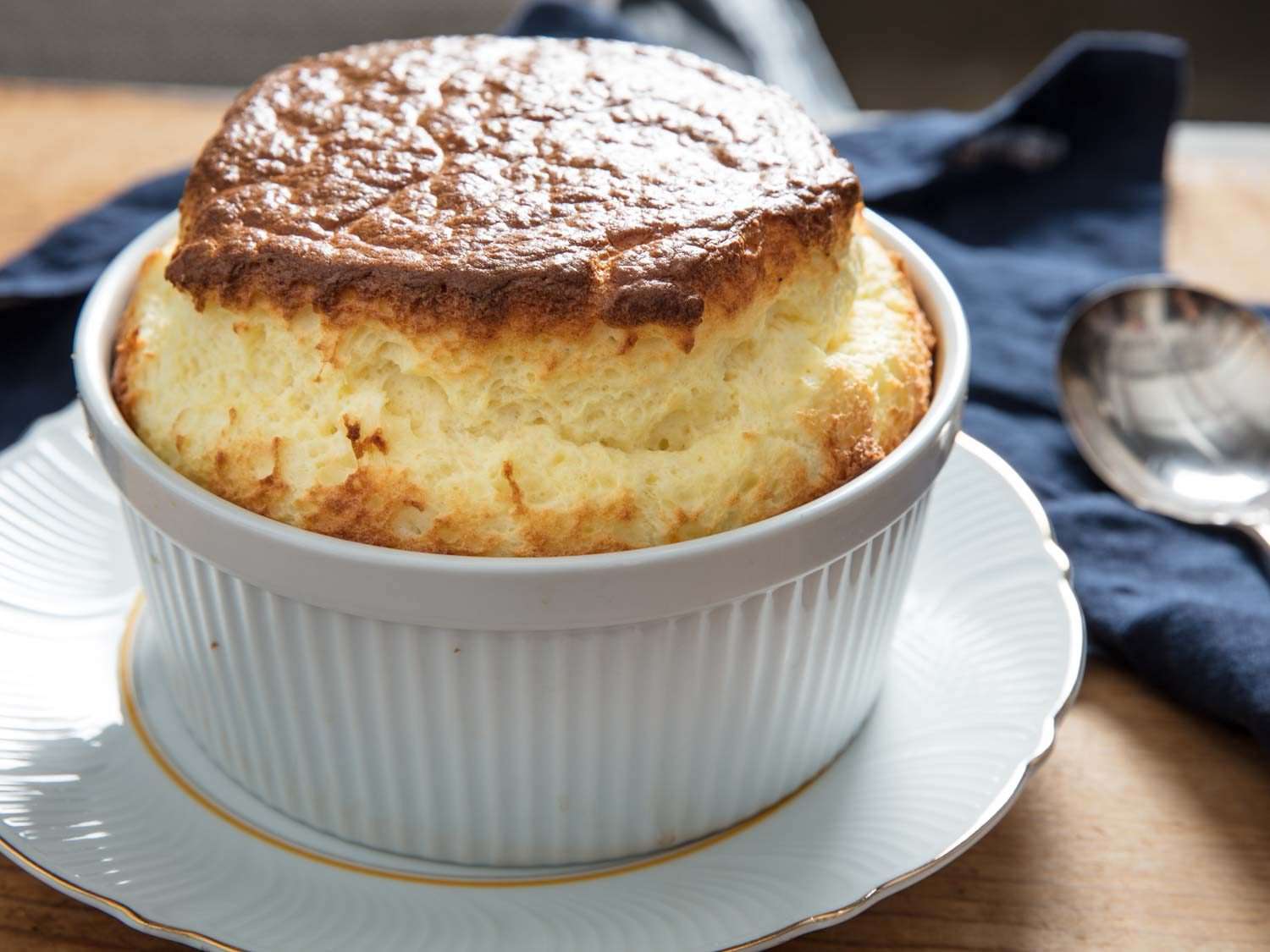 a fully cooked cheese soufflé, nicely risen