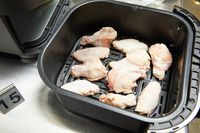 Raw chicken in the Instant Pot Vortex Plus 6-Quart ClearCook Air Fryer