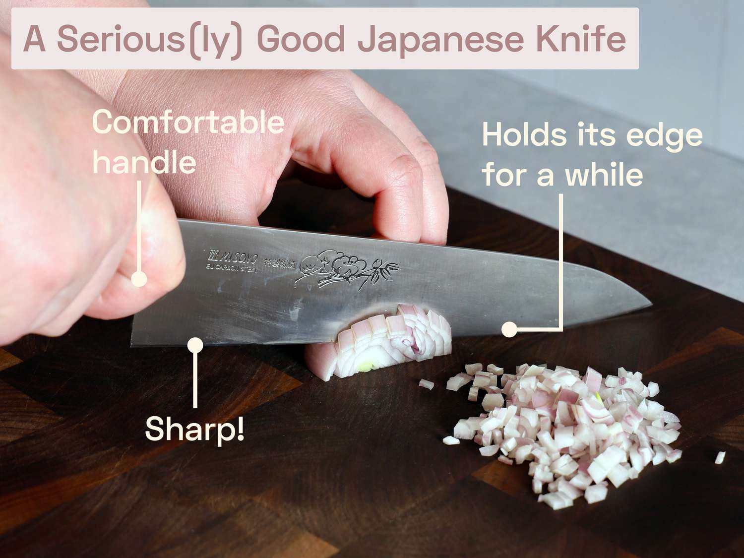 a person using a carbon steel japanese blade to mince shallots