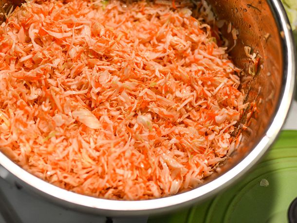 A bowl of grated vegetables for coleslaw.