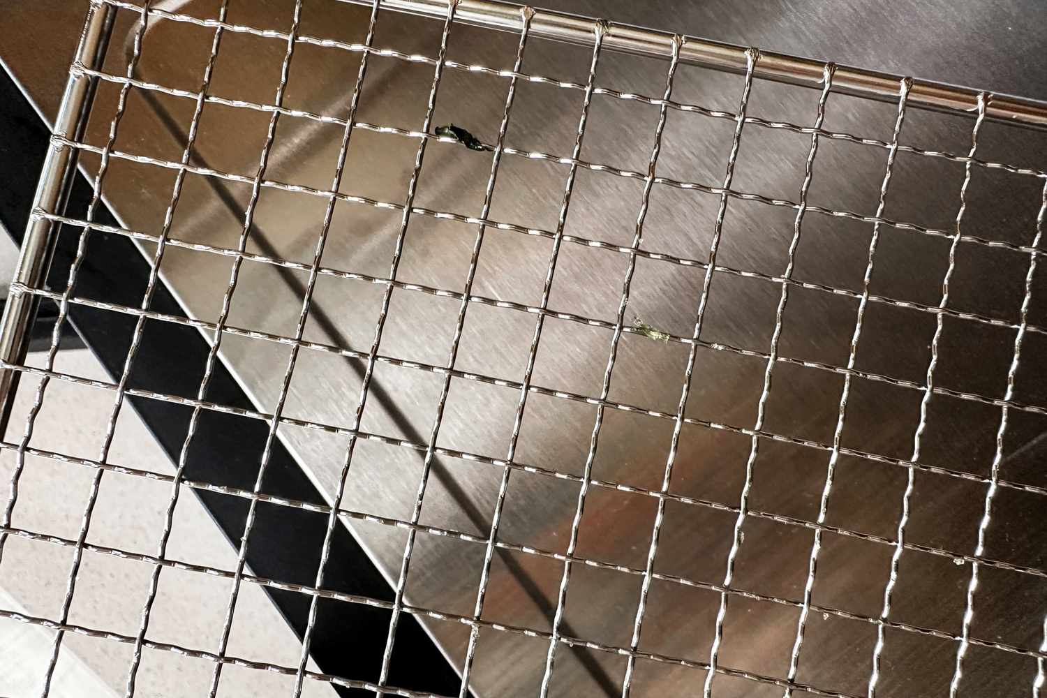 A closeup on the stainless steel racks of the Cosori food dehydrator