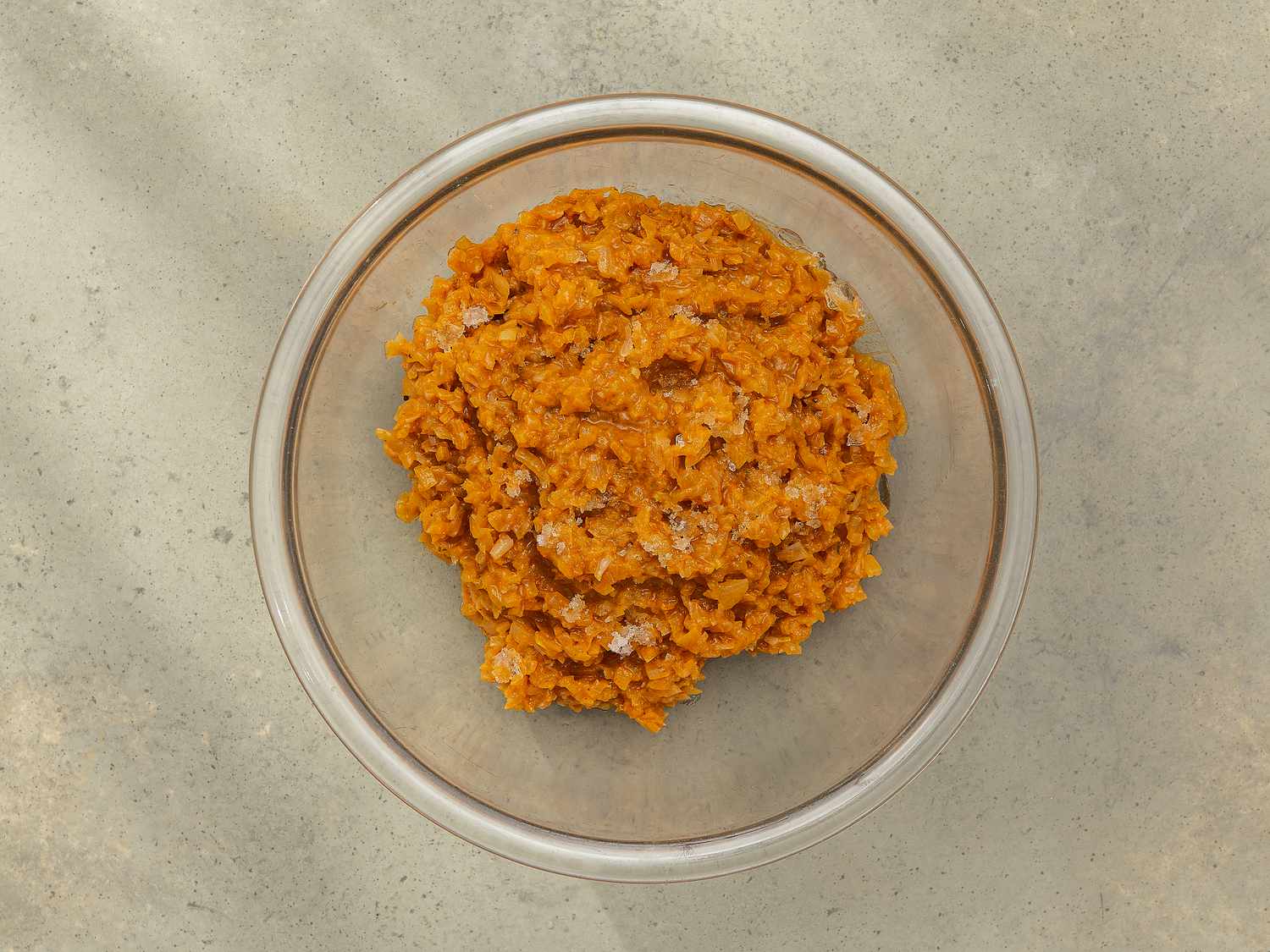 Overhead view of onion filling in a bowl