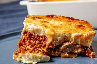 Plated moussaka showing off layers