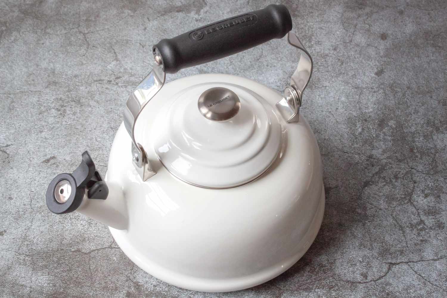 A stovetop kettle with a handle and spout