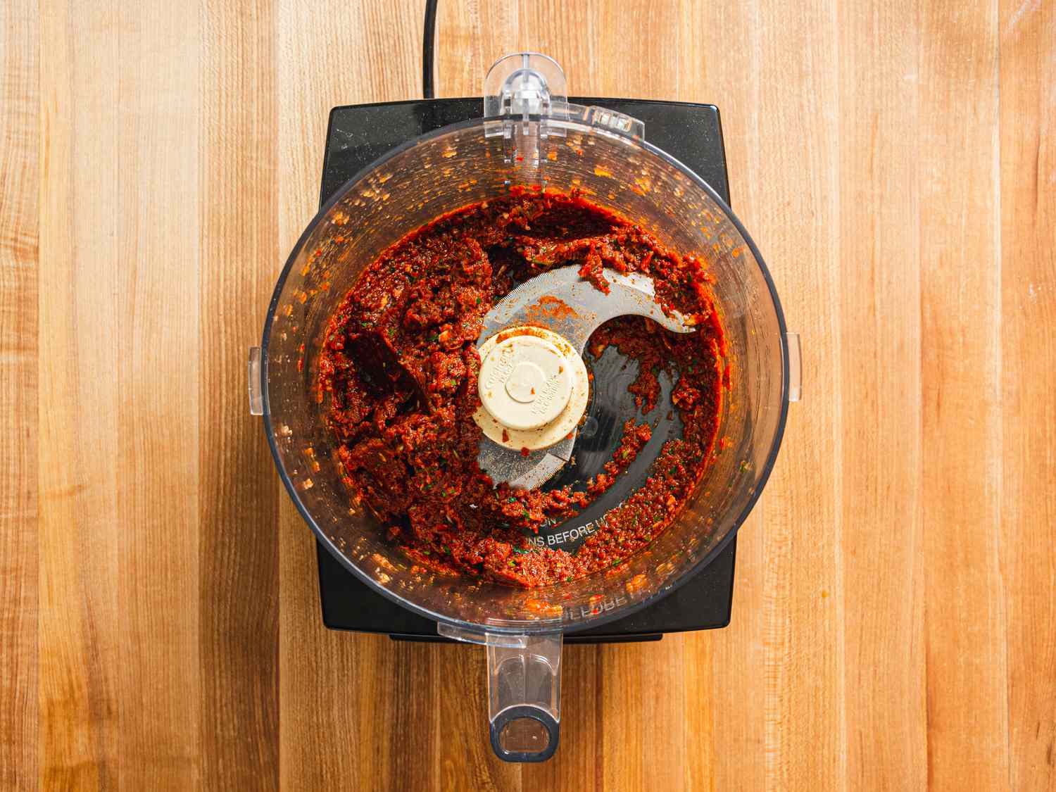 Onion-bell pepper topping in food processor.