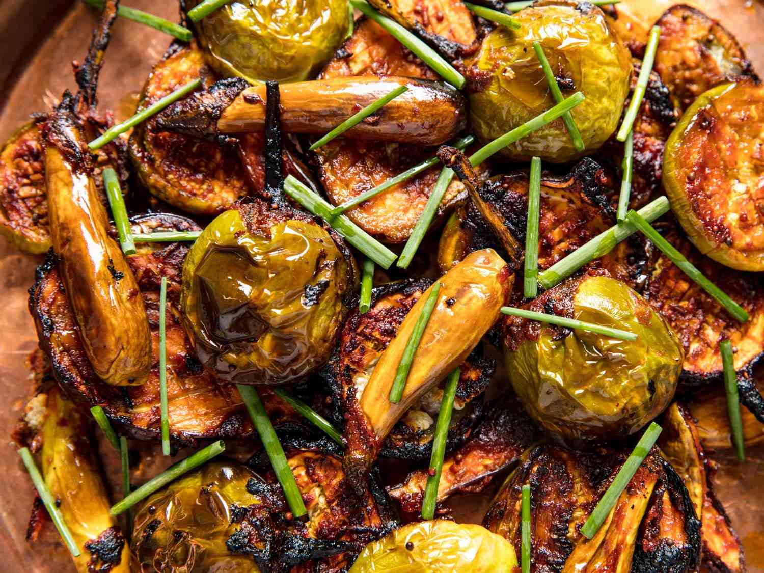 close up of baked eggplant with spice and tomato