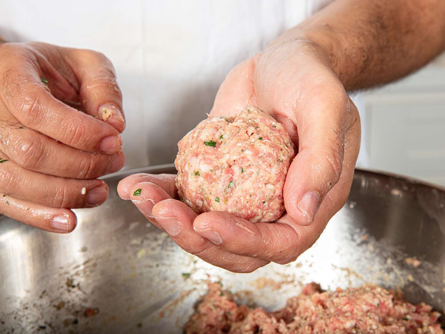 Side view of forming meatballs