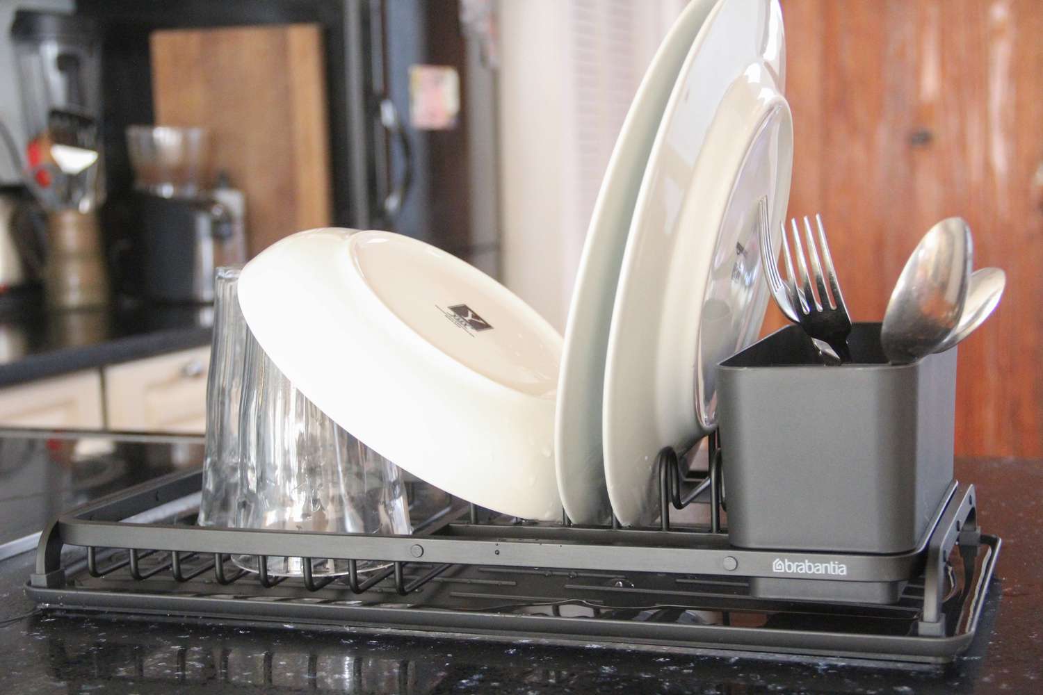 the barbantua dish rack with utensil holder and cups and plates. 
