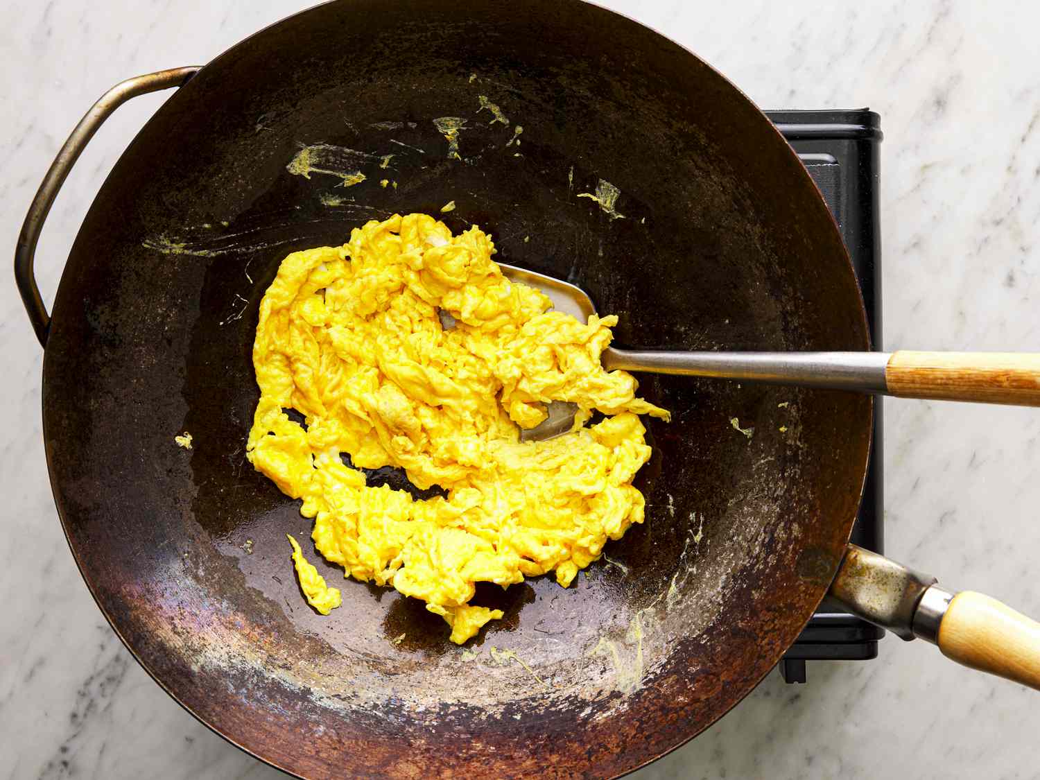 Eggs cooking in a wok