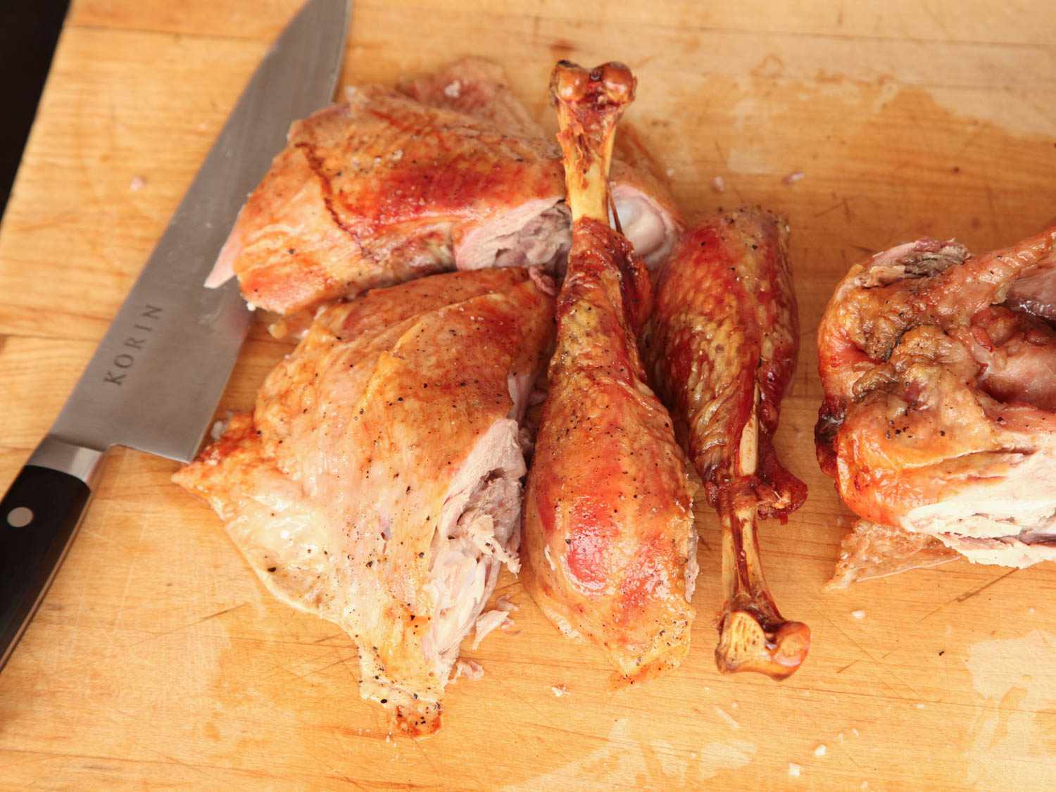 carving the dark meat of a turkey