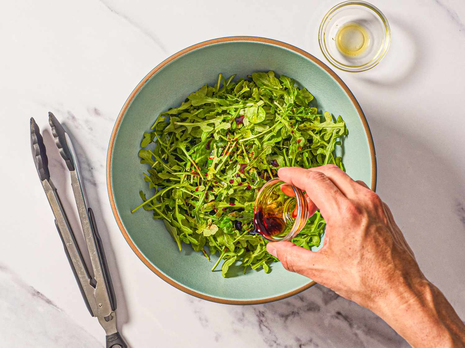 Overhead view of dressing of argula 