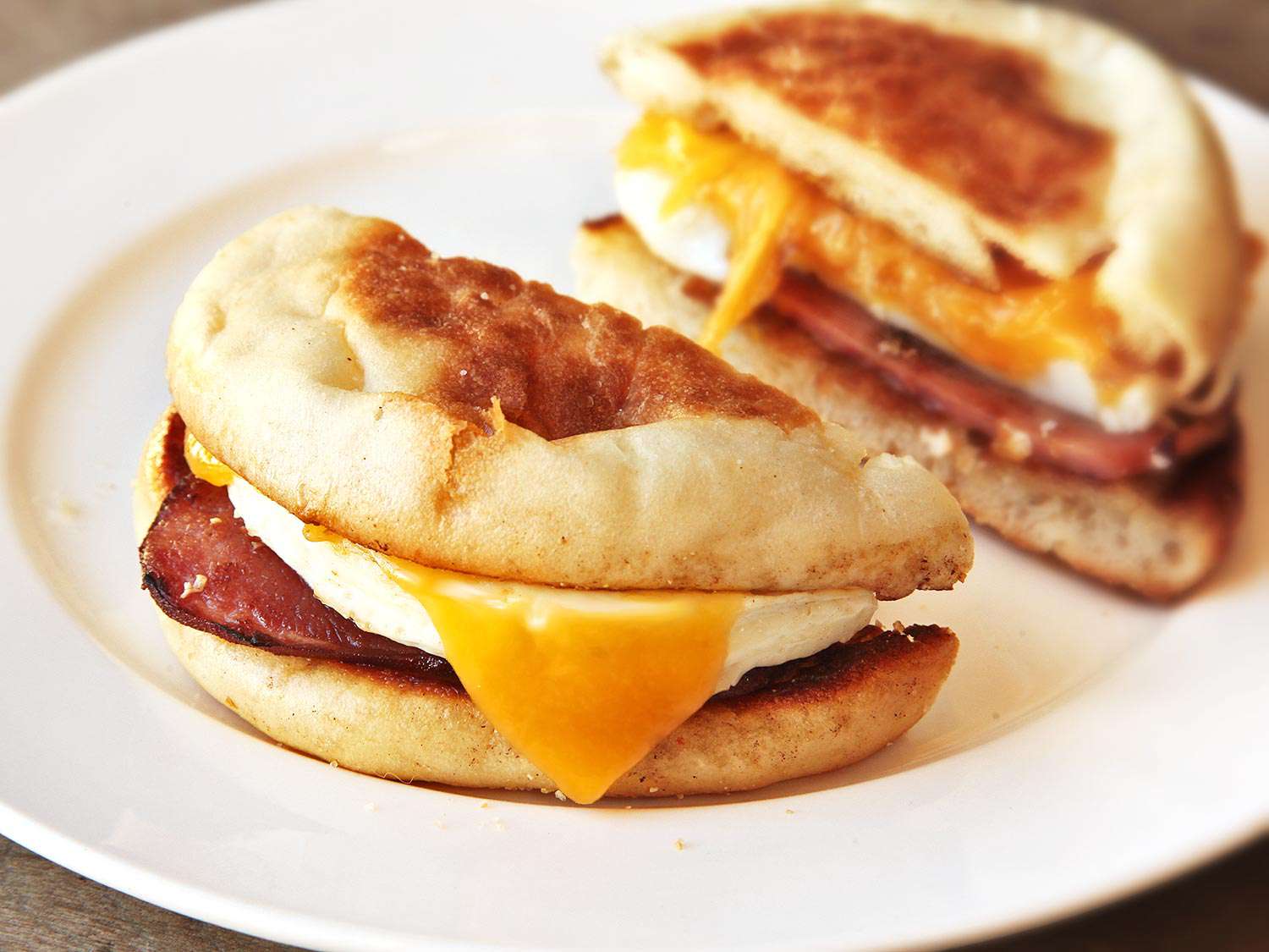 A copycat Egg McMuffin, made at home and cut in half.
