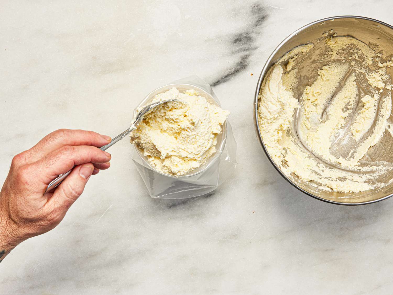 Overhead view of tranfering cream to pipping bag