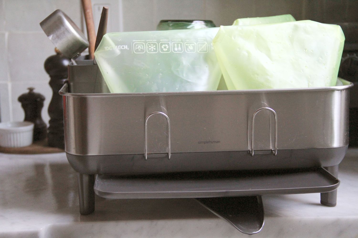 Reusable storage bags drying in a dish rack