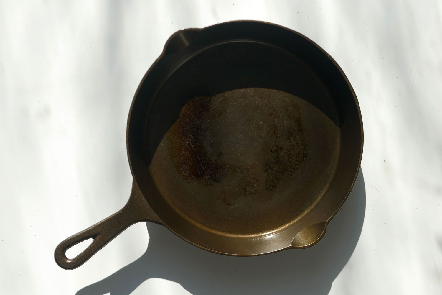 Lancaster cast iron skillet on a white background