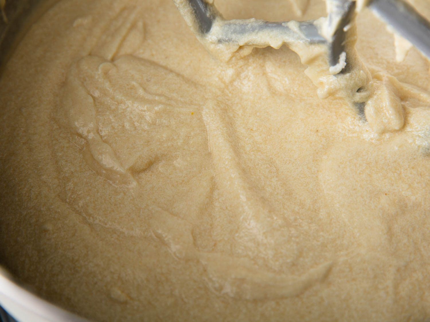 The slightly grainy, curdled appearance of the finished batter