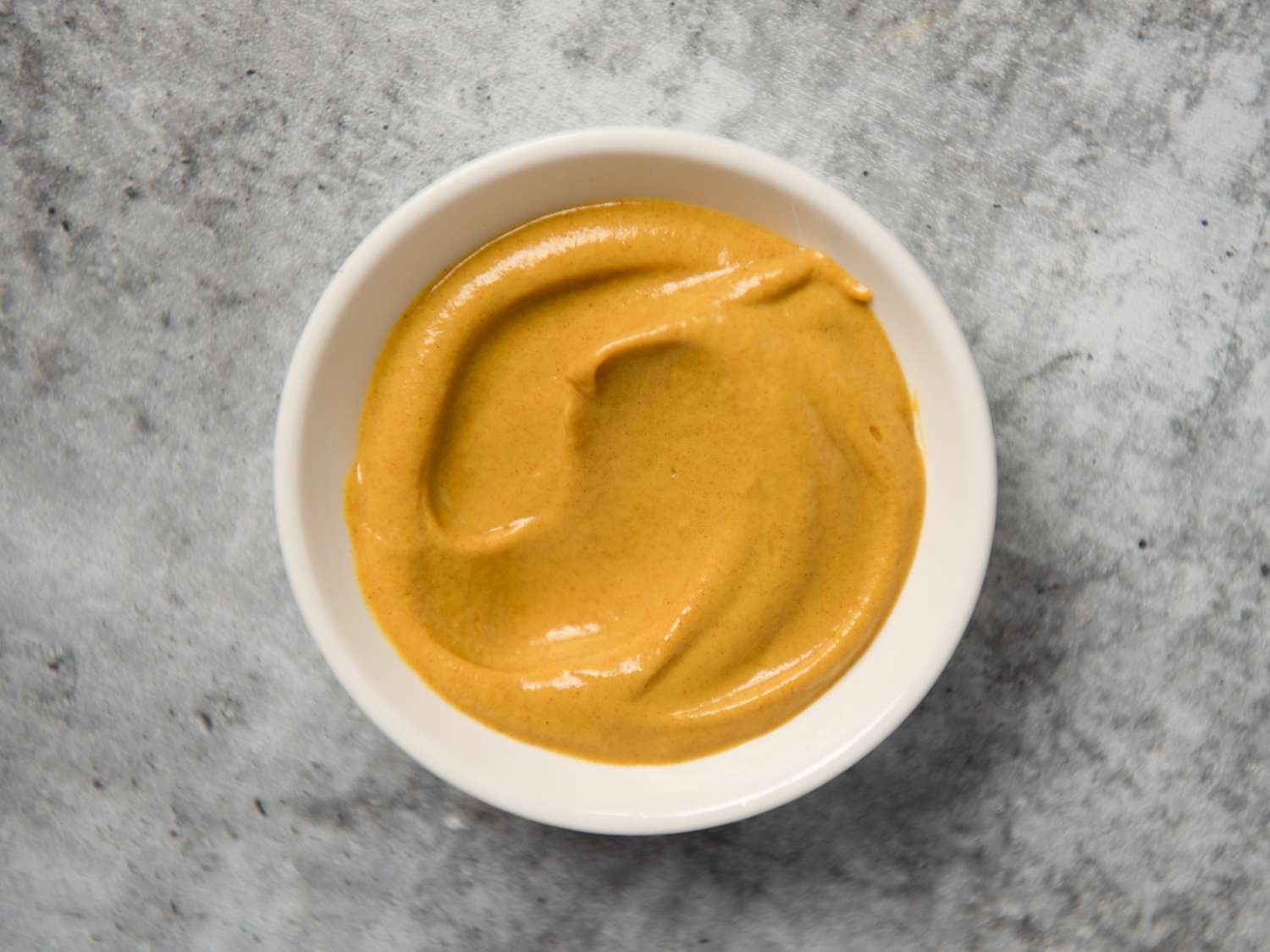 German mustard in a small white bowl