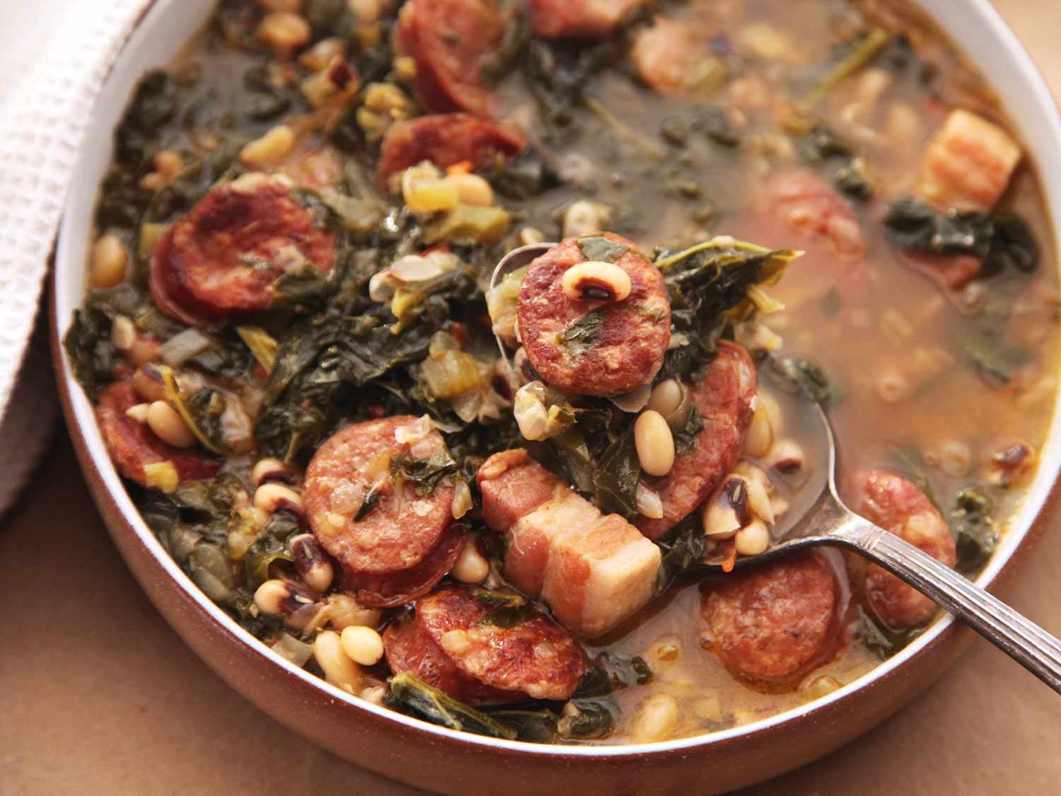 Black eyed pea stew with kale and andouille sausage.