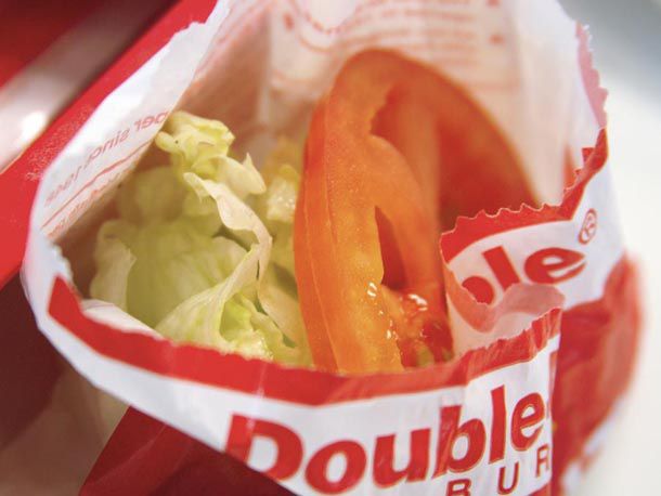 An In-N-Out side salad in a burger wrapper