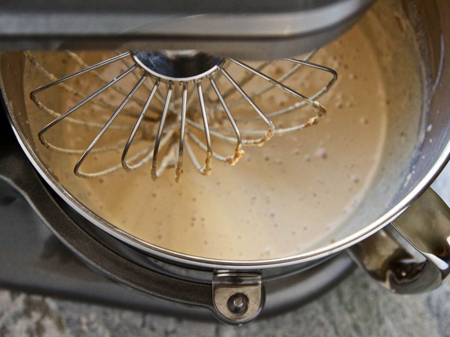 Whisking the filling of Snickers pie in a stand mixer.