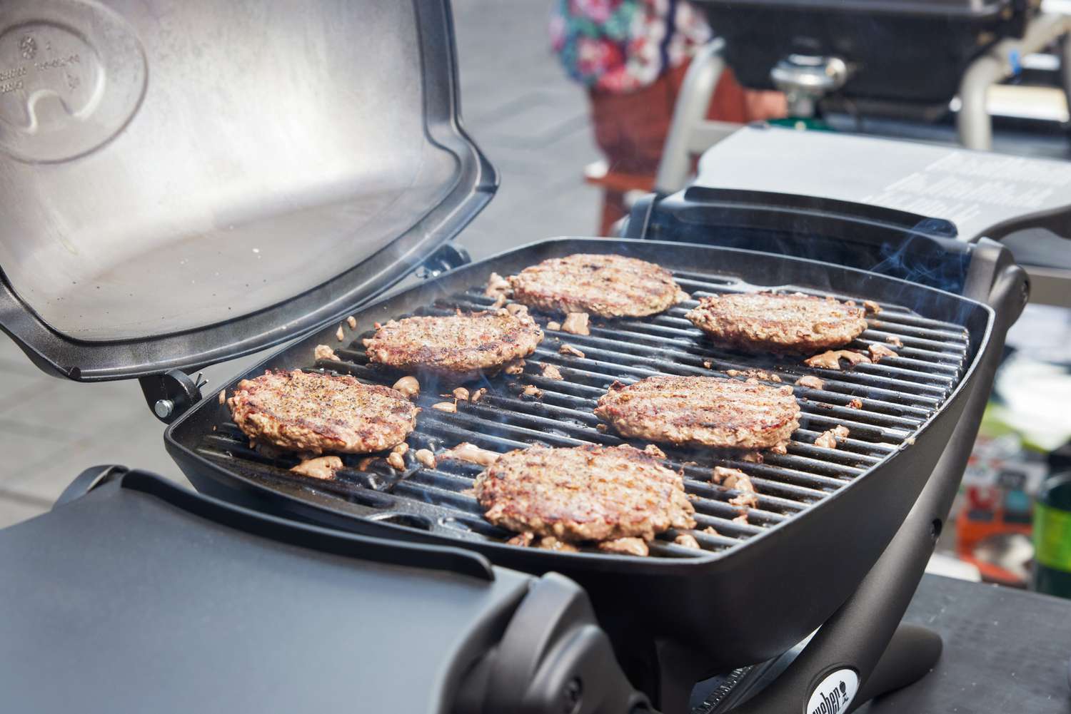 Burgers cooking on the Weber q1200 gas grill.