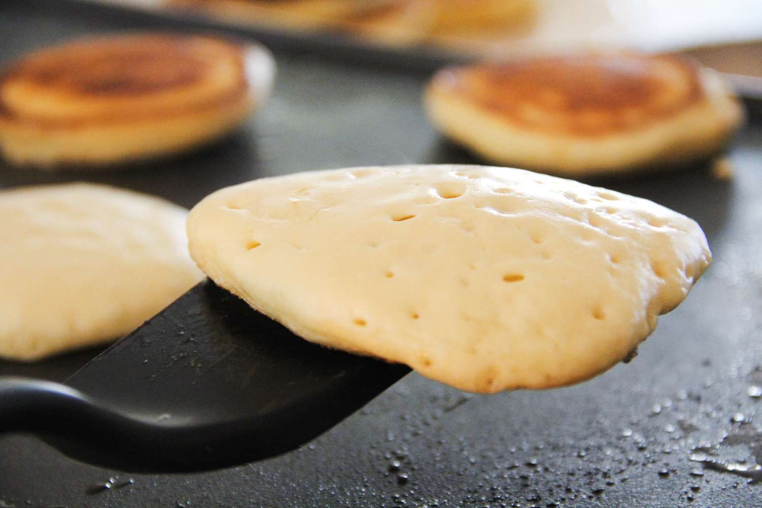 A close up of a pancake on the GIR Premium Silicone Mini Flipper