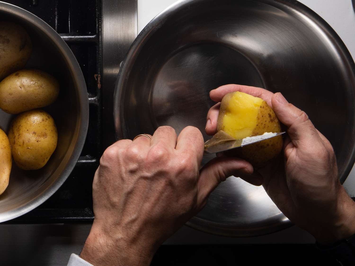 Peeling cooked Yukon Gold potatoes