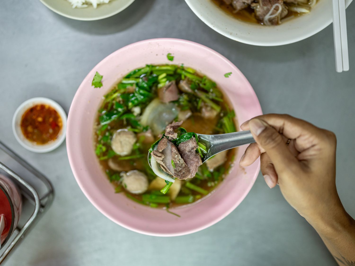 Overhead view of beef noodle soup