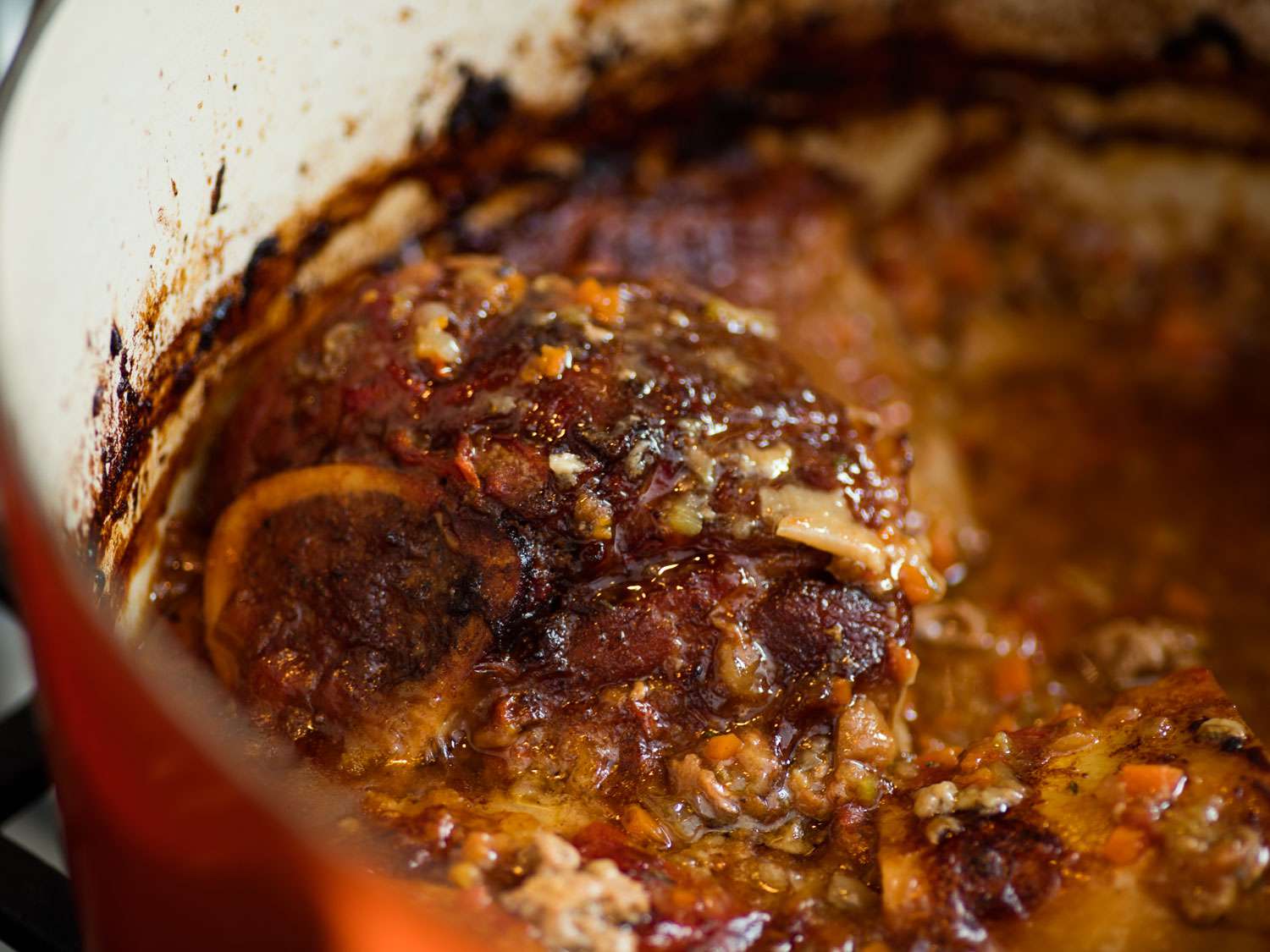 Browned osso buco in a Dutch oven.