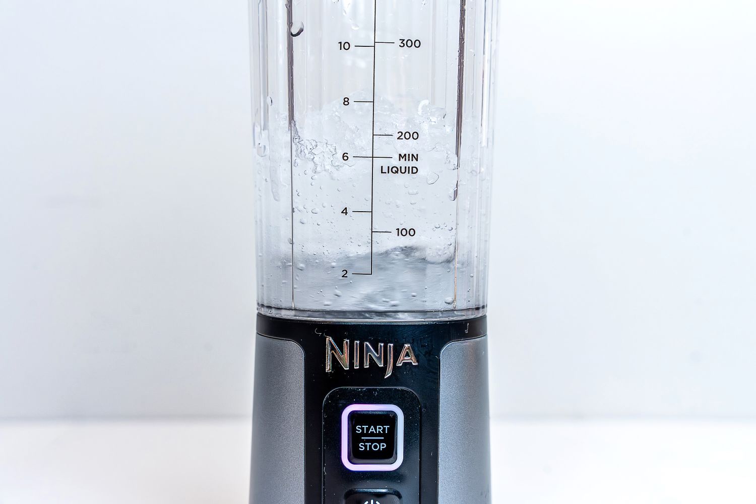 Closeup of blended ice inside the Ninja Blast Portable Blender