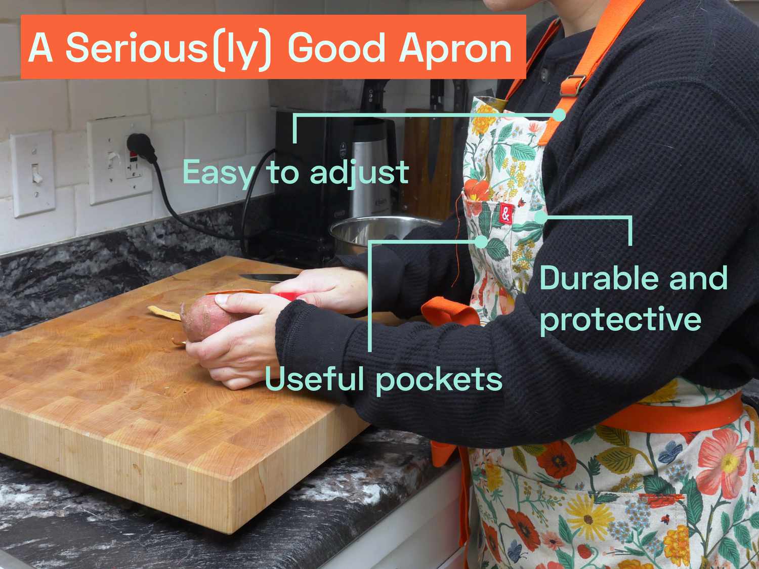 a person using the hedley and bennett apron while peeling a sweet potato