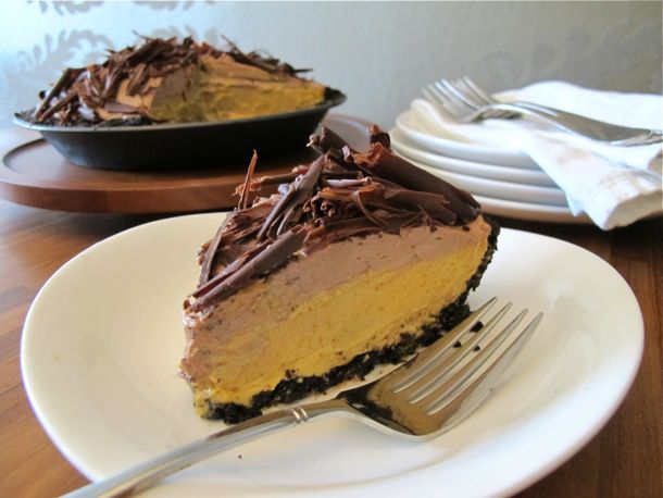 A slice of chocolate pumpkin mousse pie on a plate.