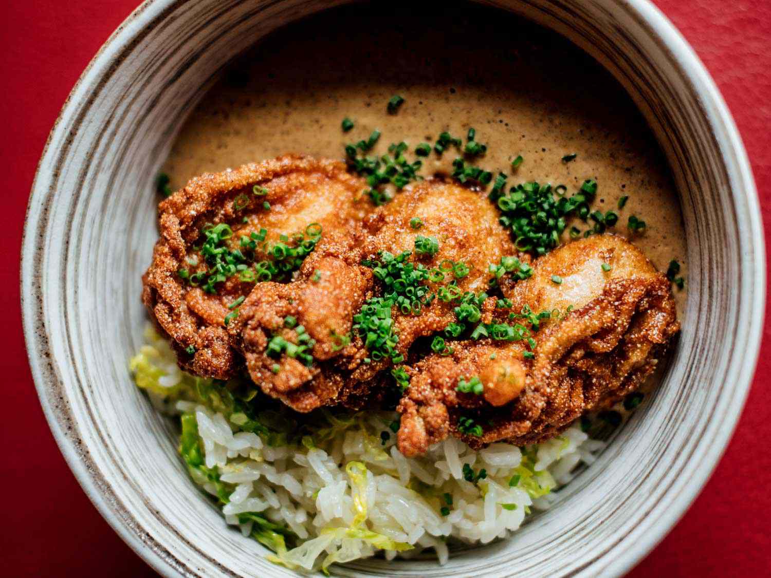 Fried oysters with rice and gravy at Bywater American Bistro.