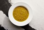 Overhead view of split pea and hand soup