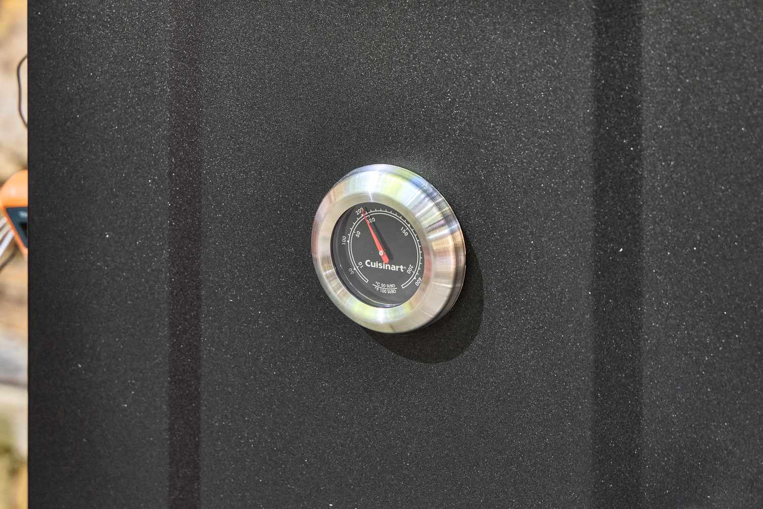 The thermometer on the Cuisinart COS-244 Vertical 36-inch Propane Smoker