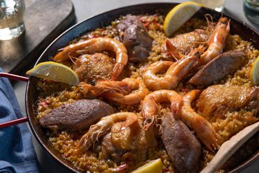 Stovetop paella mixta in a paella pan. 