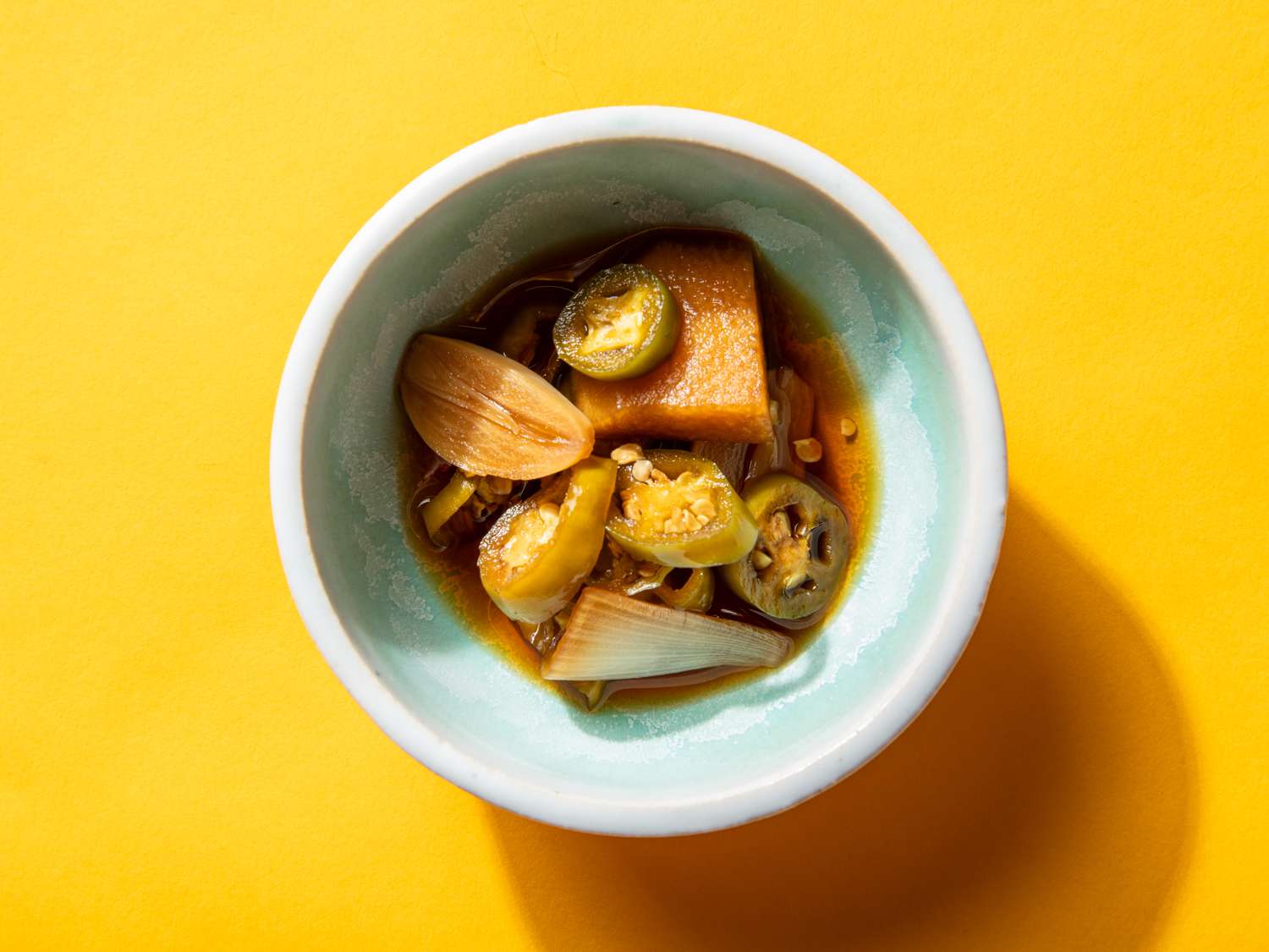 A small banchan-sized serving bowl of Korean soy-pickled vegetables