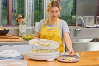 A person testing Nesco Gardenmaster Digital Pro Food Dehydrator