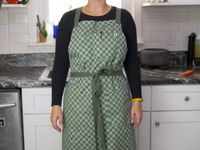 a person wearing the crossback apron