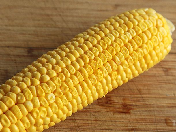 An ear of corn with some kernels drying out.