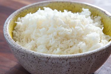 A bowl of fluffy rice, cooked in the microwave.