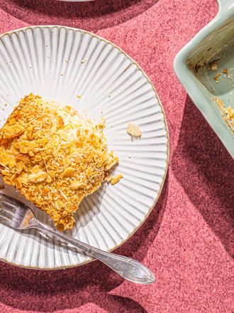 A square of yellow squash on a round plate.