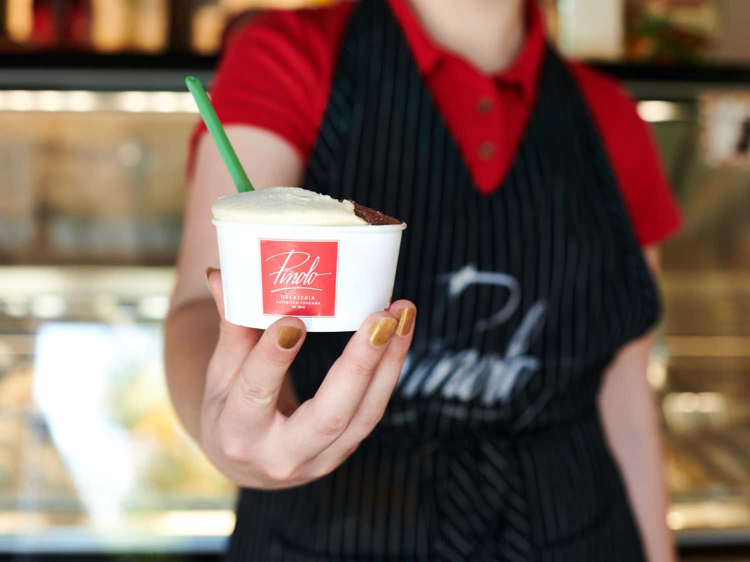 A to-go bowl of gelato served at Pinolo Gelato