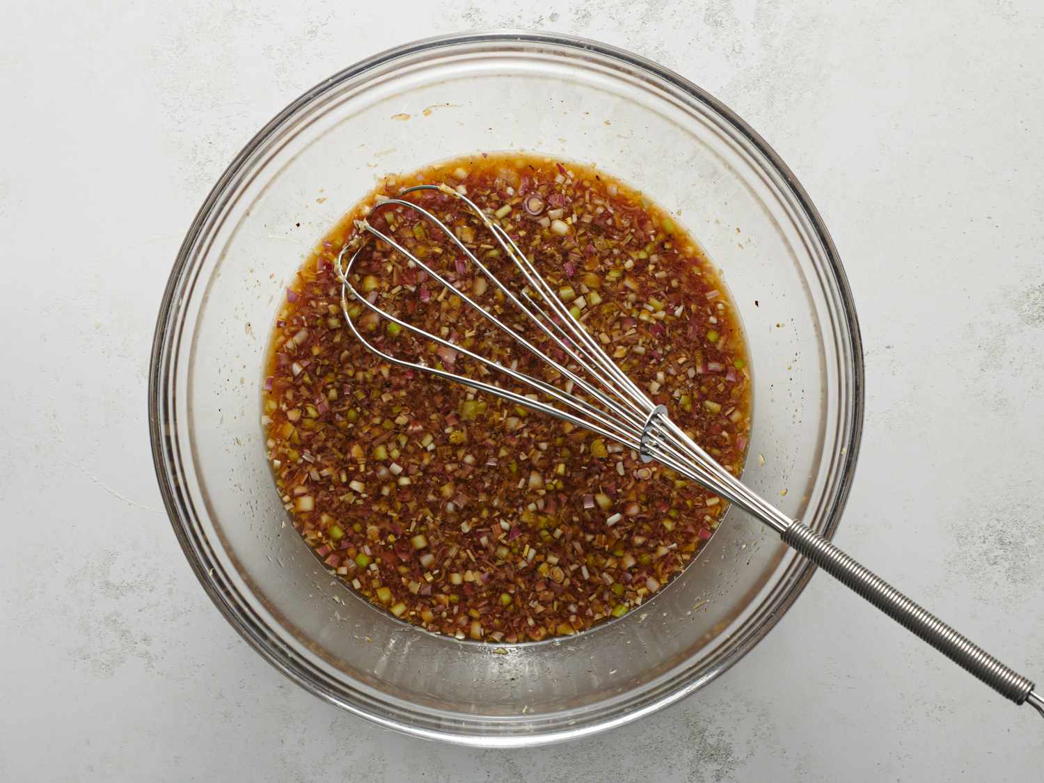 Ingredients mixed all together in a white bowl 