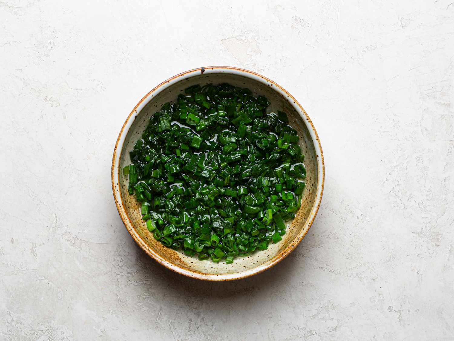 Overhead view of scallion oil