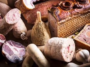 A selection of the charcuterie Shapiro produces. At center is a mini ham. Clockwise from the right: pâté en croûte, chicken galantine, saucisson à l'ail, capocollo, pancetta, guanciale.