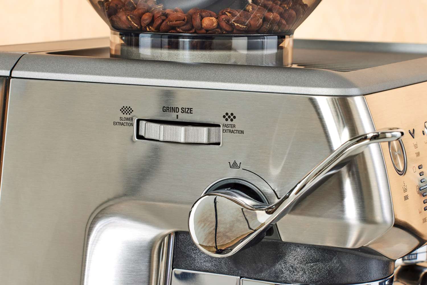 Close up of the grind size wheel on the Breville Barista Express Impress