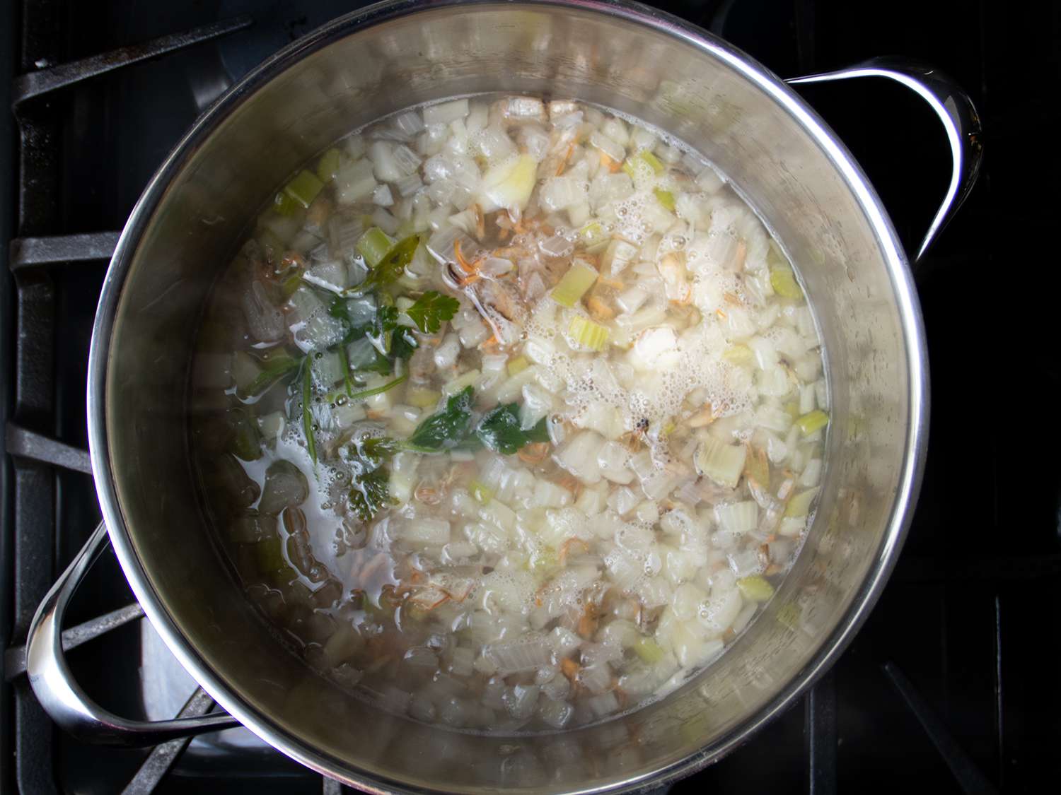 A pot of unstrained shrimp stock.